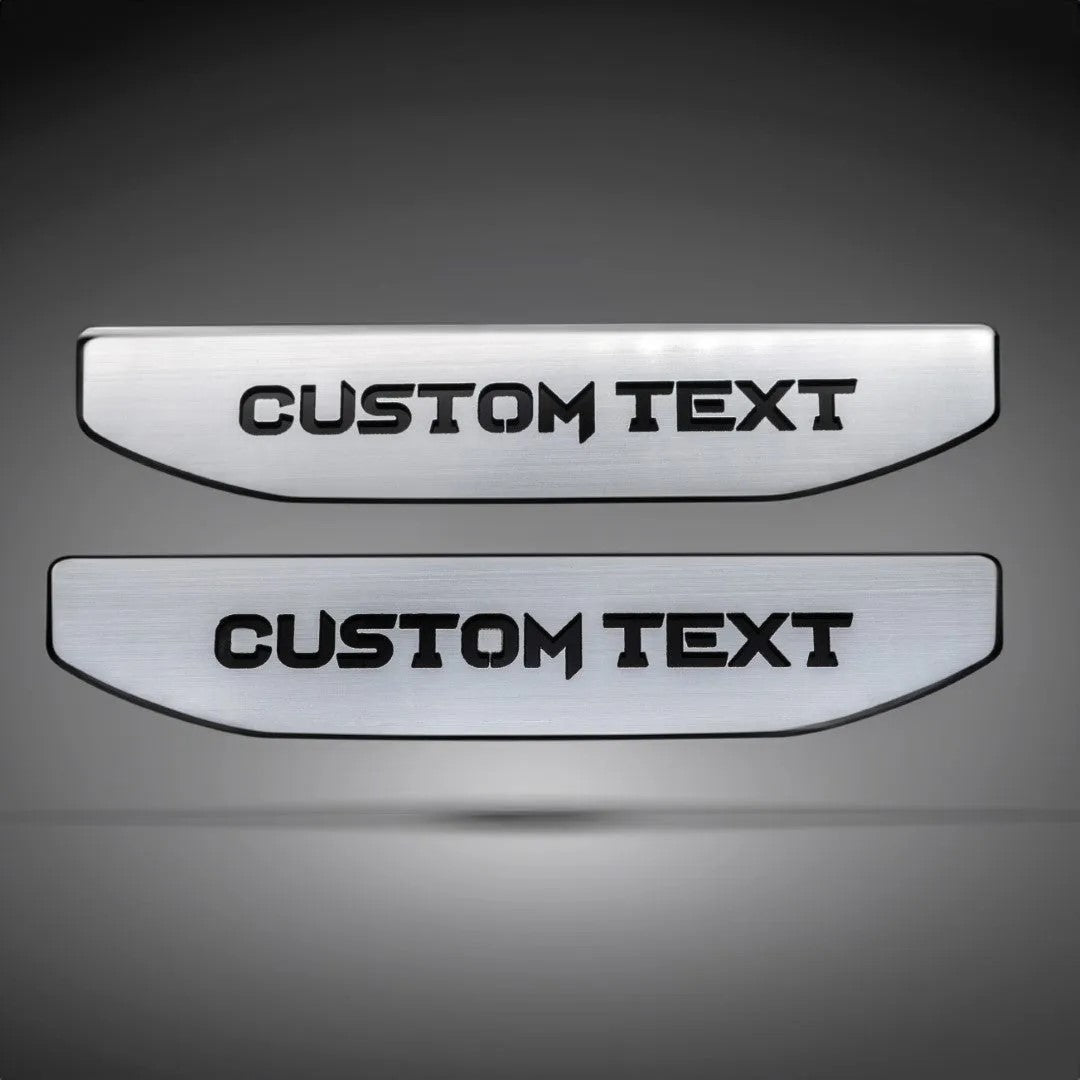 A pair of custom inserts for the 2020-2024 GMC 1500. Choose your custom text and 2 colors.