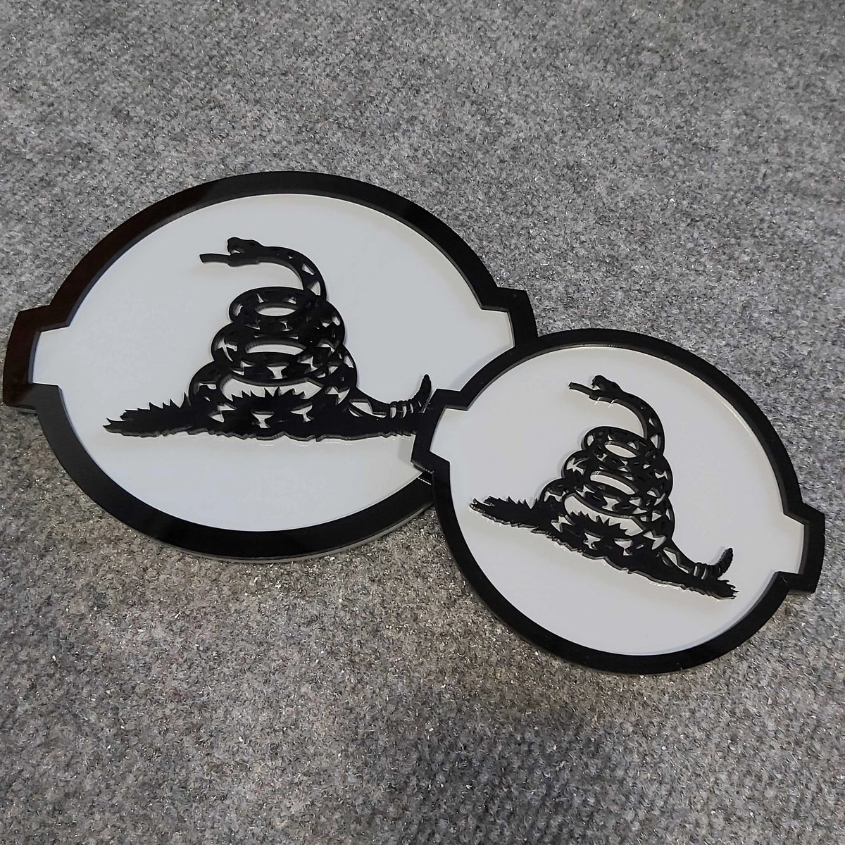 Don't Tread On Me Snake Badge- Fits 2016-2024 Nissan® Titan® Grille and Tailgate - Black on Gray